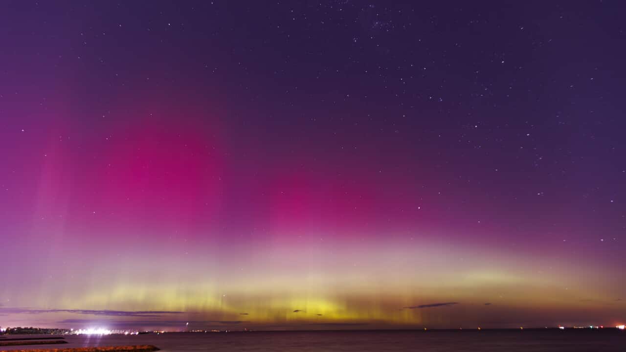 The Aurora Australis illuminates the sky from Brighton beach