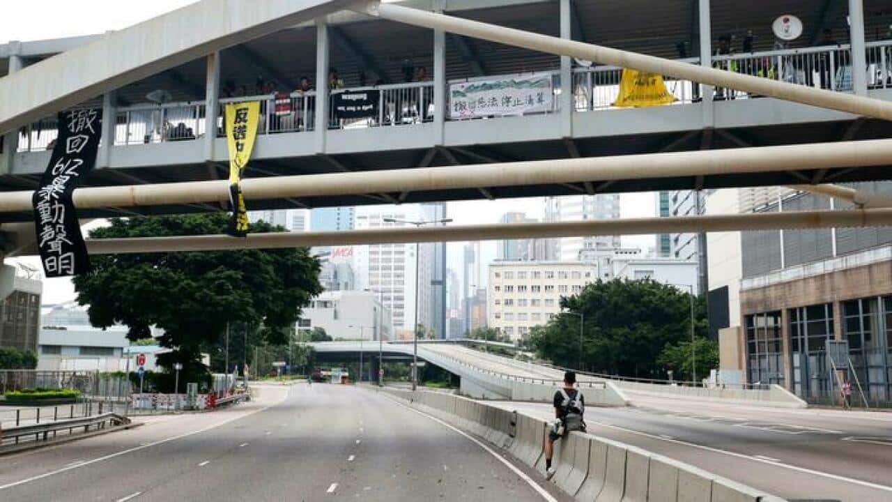 Empty roads in central Hong Kong after demonstrators were cleared following a rally demanding the resignation of leader Carrie Lam