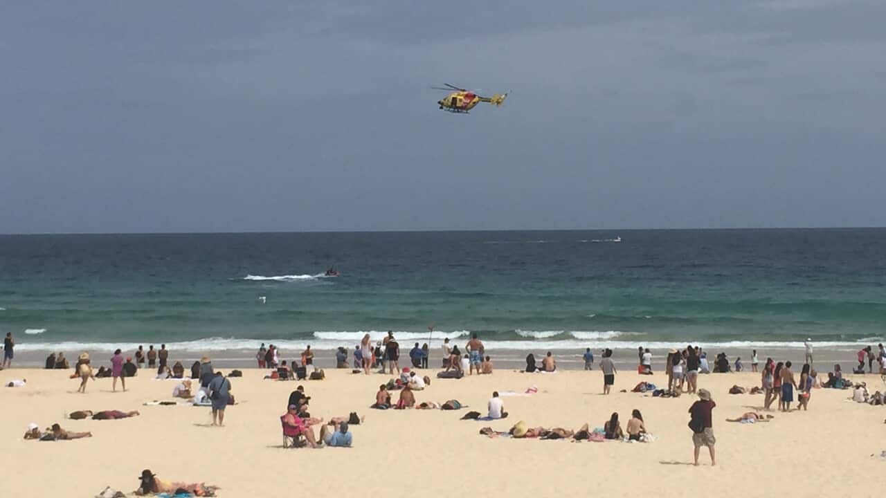 A helicoper patrols Sydney's iconic Bondi Beach (File: AAP)