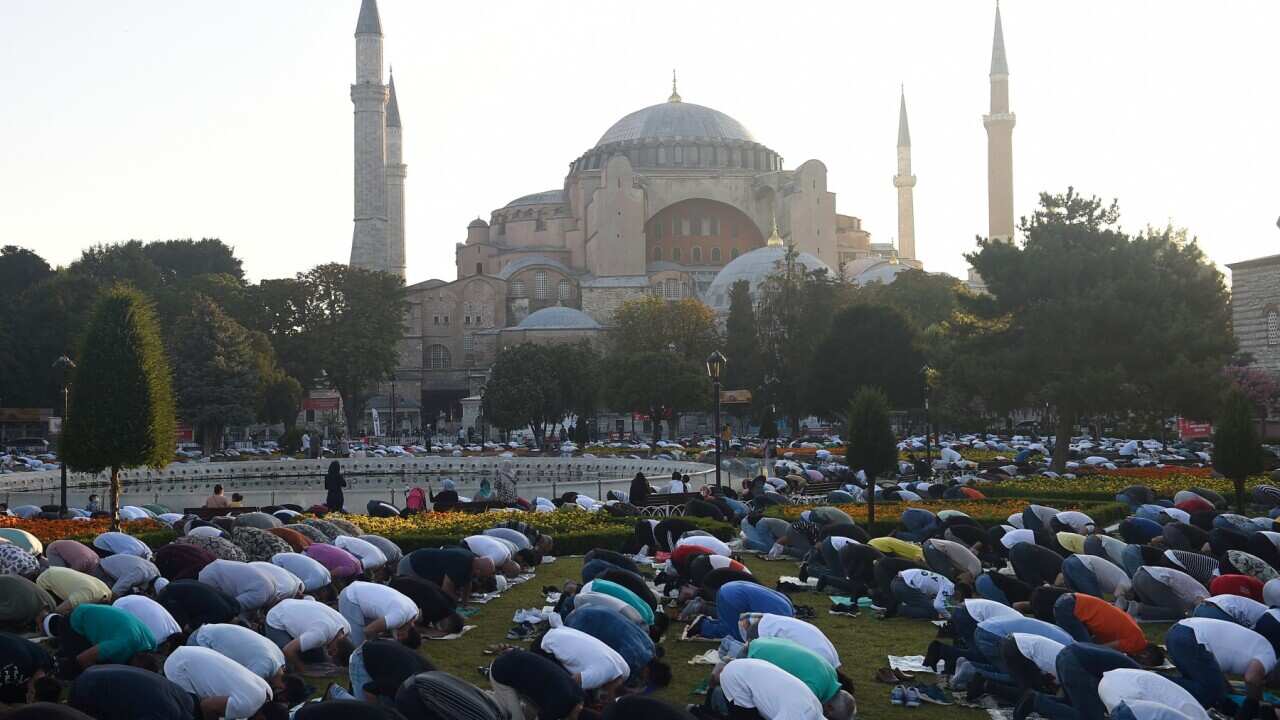 Muslims, offer their prayers during the Eid al-Adha prayer