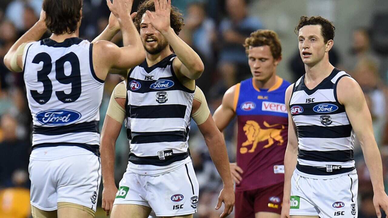 Geelong Cats players celebrate