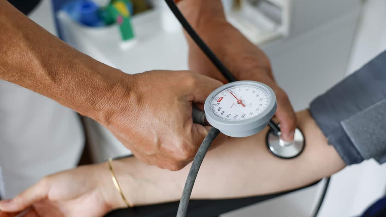 A blood pressure test being performed