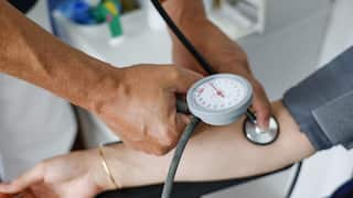 A blood pressure test being performed
