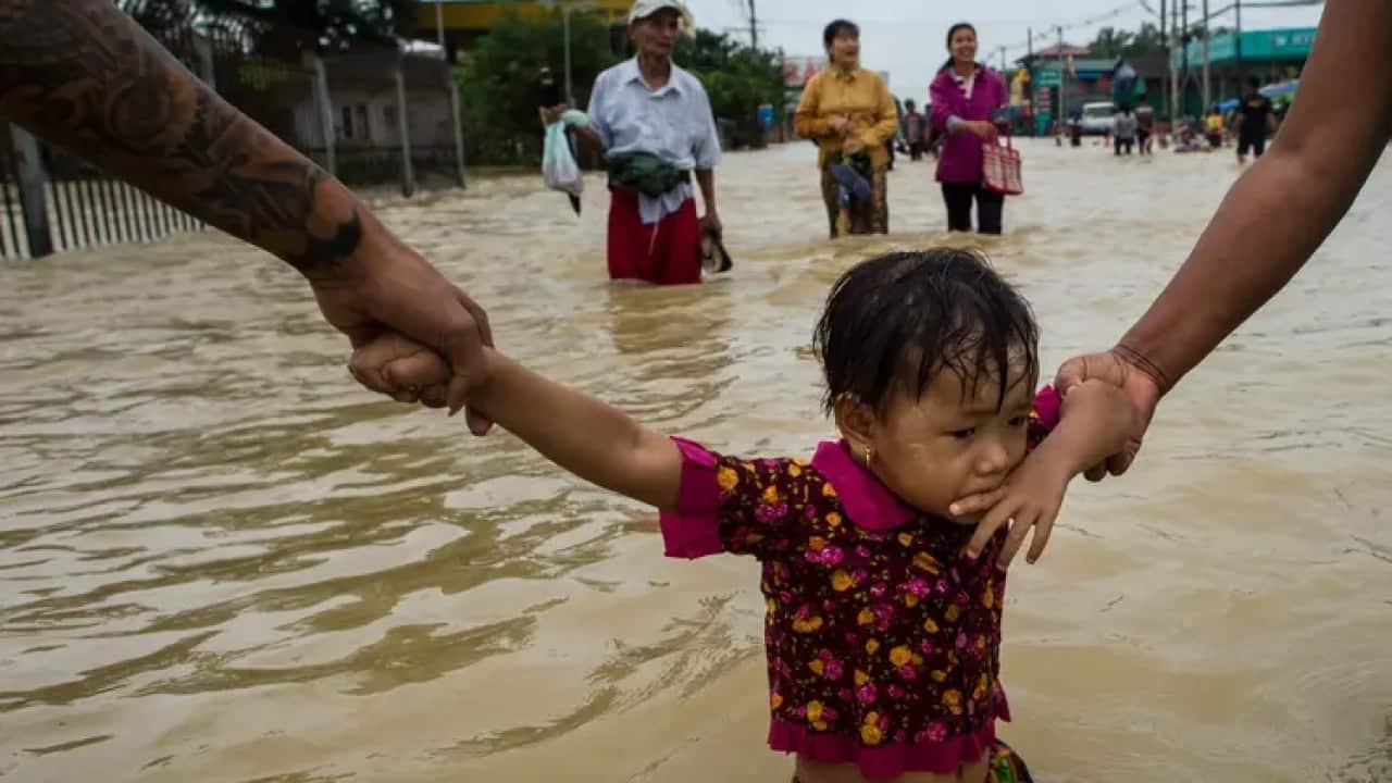 Children caught in floods.webp