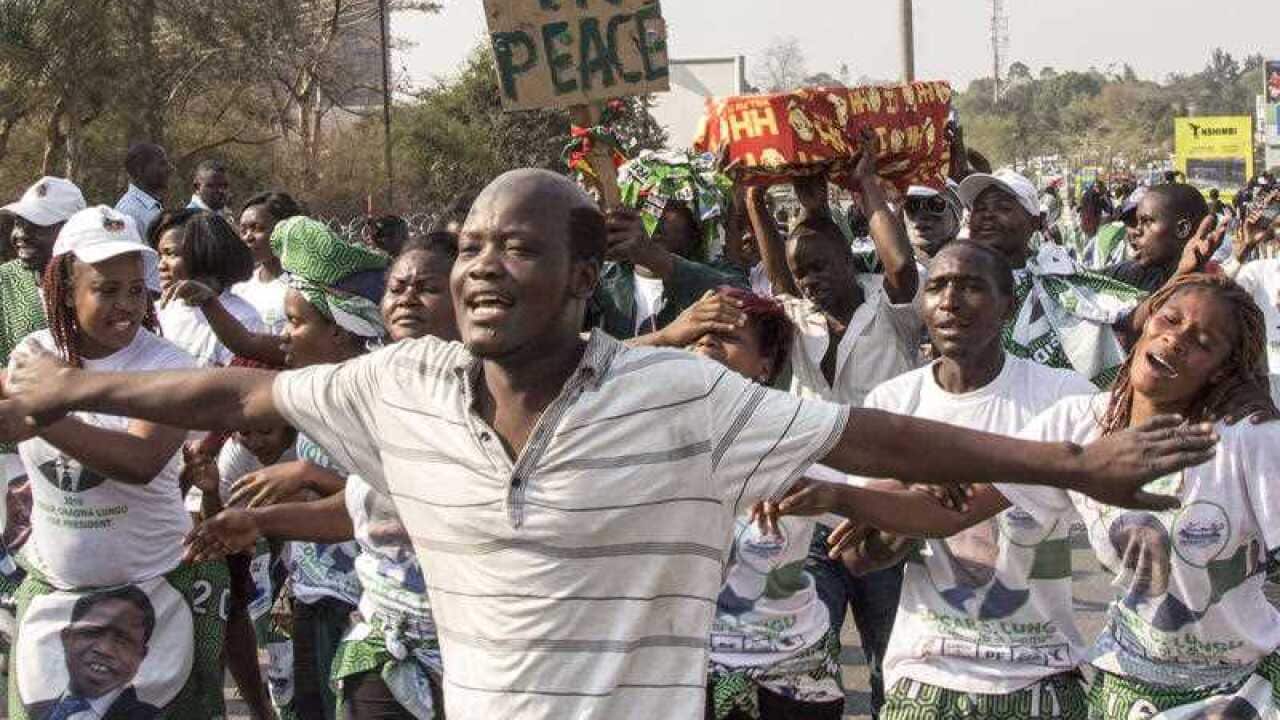 Supporters of the ruling party jubilate the results of the presidential elections in Lusaka, Zambia, Monday, Aug. 15, 2016.
