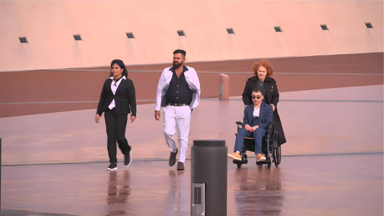 The refugees' delegation arrives at Parliament House (SBS).jpg