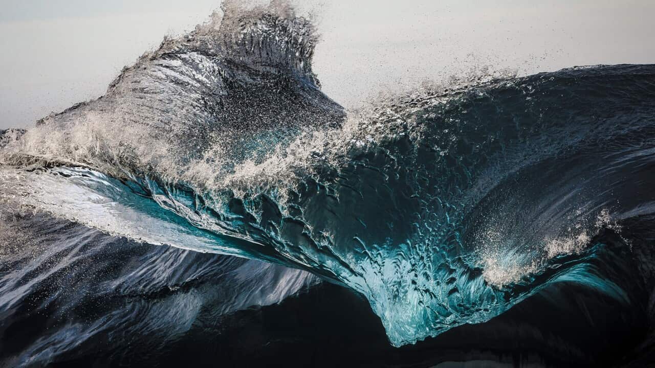 Extreme close up of thrashing emerald ocean waves