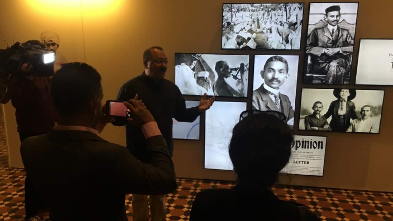 Curator Birad Rajaram at the exhibition