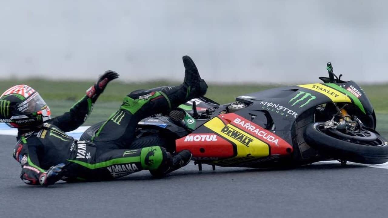 Italian Moto3 rider Romano Fenati crashing.