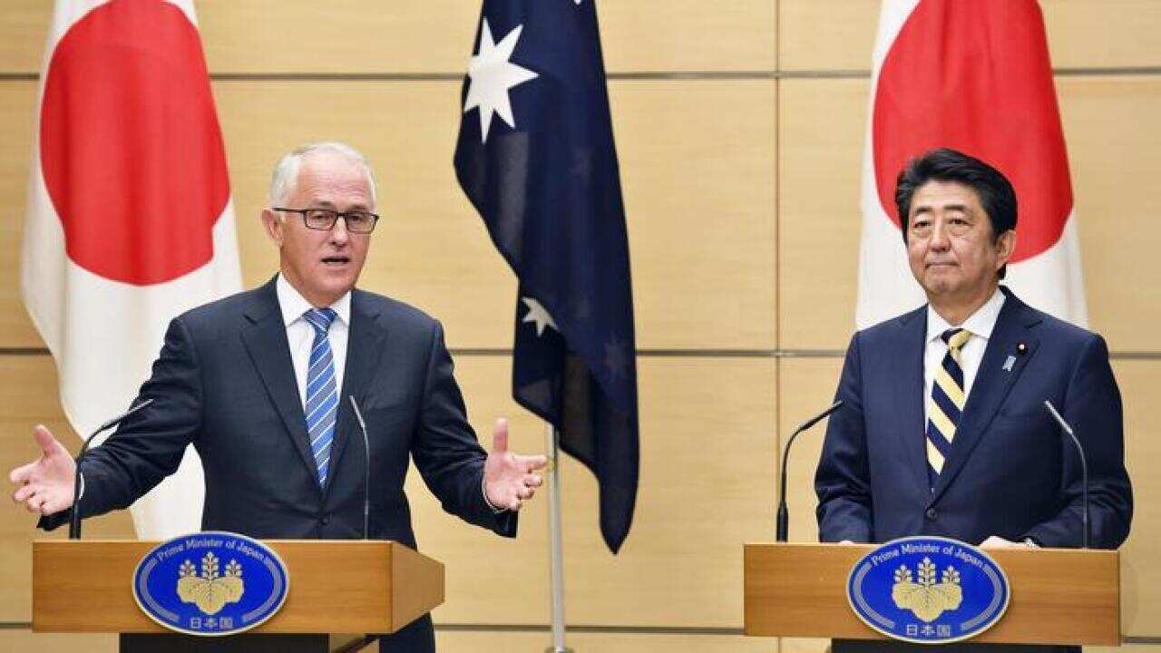 Japanese Prime Minister Shinzo Abe (R) and his Australian counterpart Malcolm Turnbull hold a joint press conference at the prime minister's office in Tokyo on Jan. 18, 2018. (Kyodo)==Kyodo