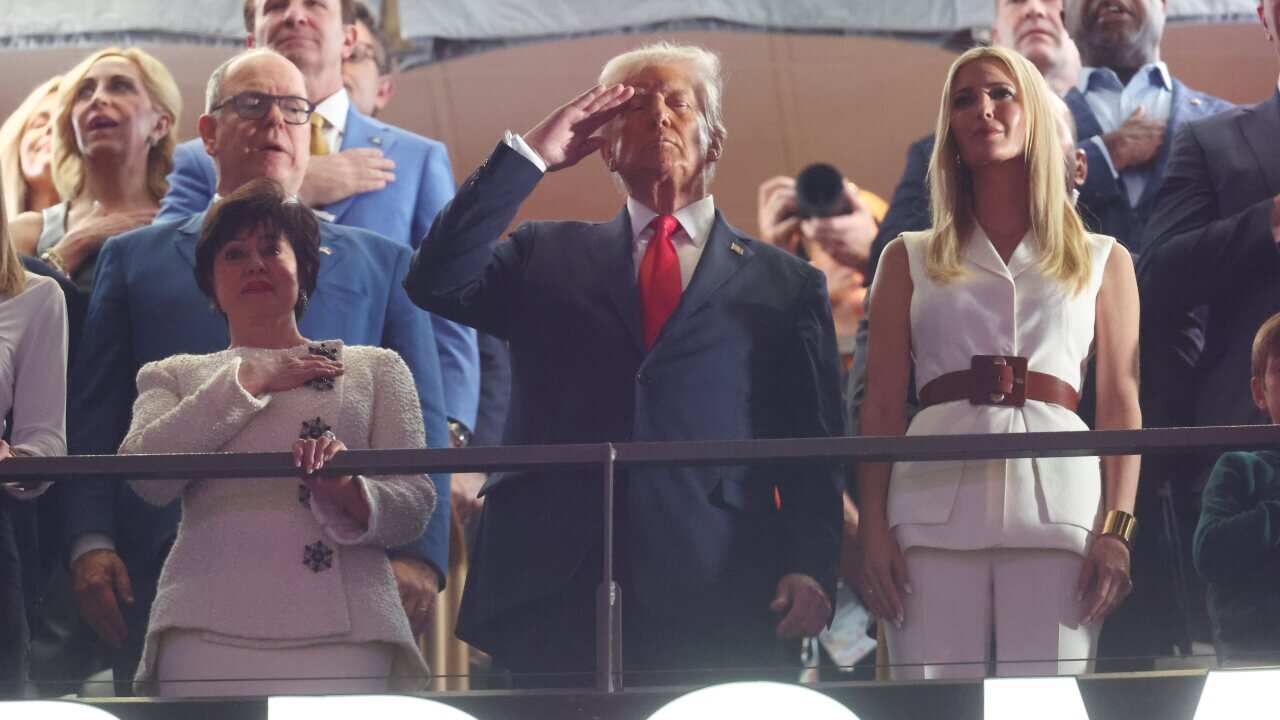 President Donald Trump and Ivanka Trump react during the playing of the national anthem in Super Bowl LIX between the Philadelphia Eagles and the Kansas City Chiefs at Ceasars Superdome.
