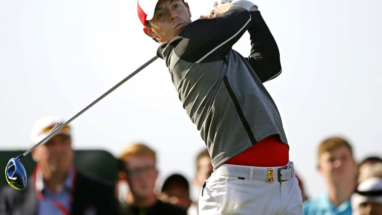 Rory McIlroy of Northern Ireland tees off in Abu Dhabi