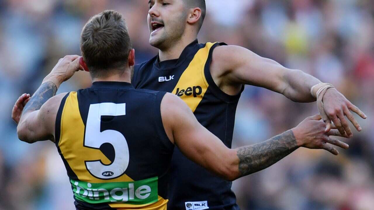 Shaun Grigg of the Tigers scores a goal