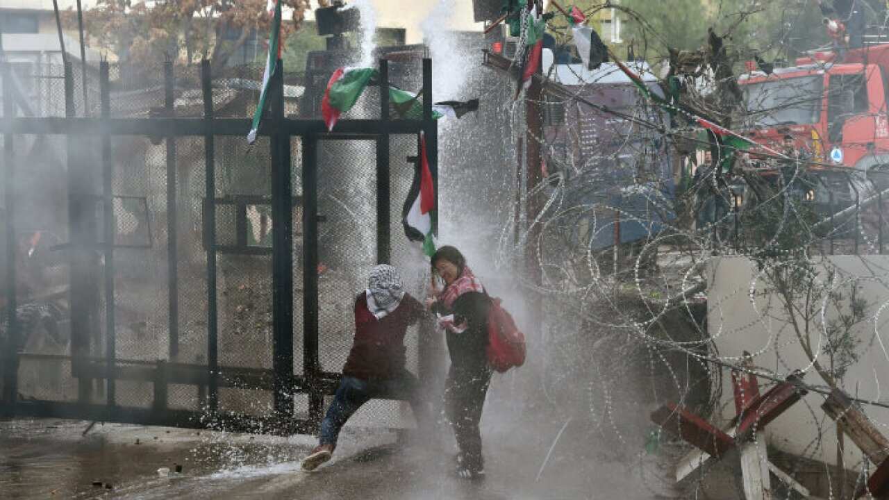 Protesters in Beirut are stopped from approaching the US embassy
