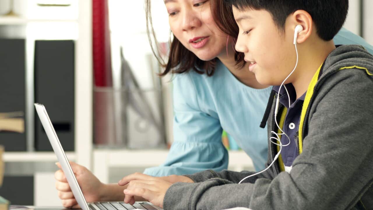 cute-asian-mother-helping-your-son-doing-your-homework-at-home-with-smile-face-togethe-SBI-351237686.jpg