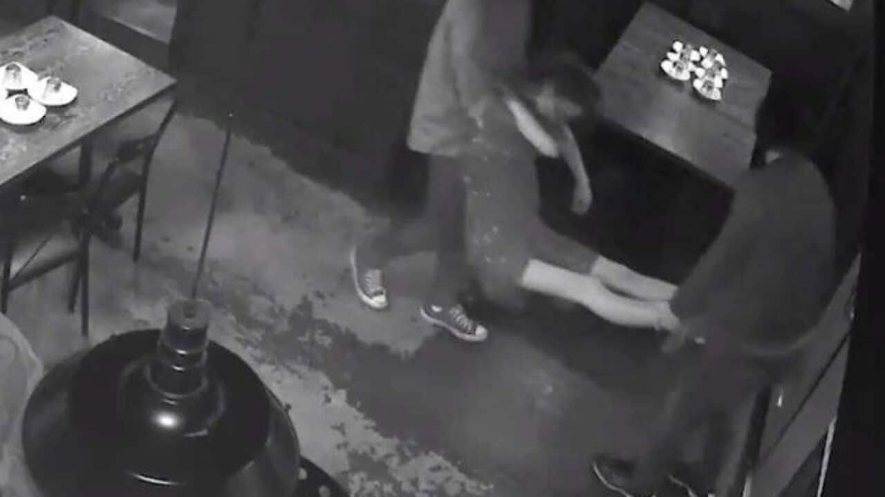 PHOTO: CCTV footage showed an unconscious woman being carried out of the restaurant. (NSW Liquor and Gaming Authority)