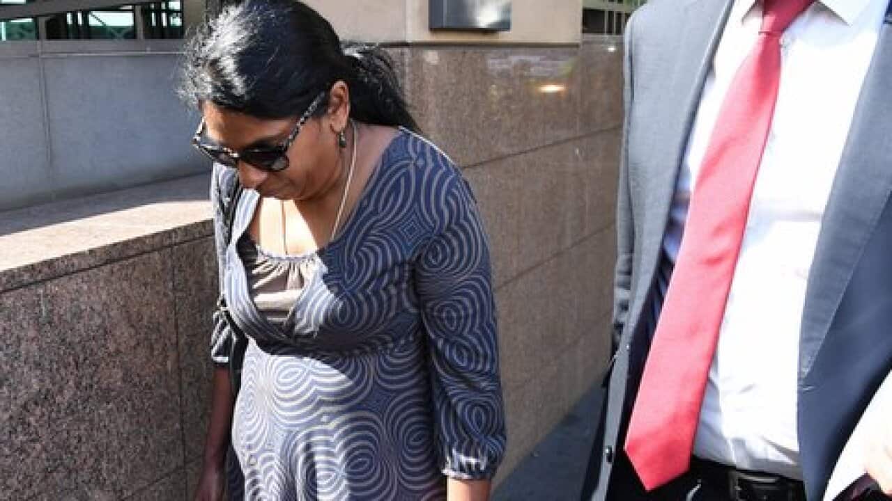 Kumuthini Kannan leaves the Melbourne Magistrates Court, in Melbourne, Tuesday, December 12, 2017.