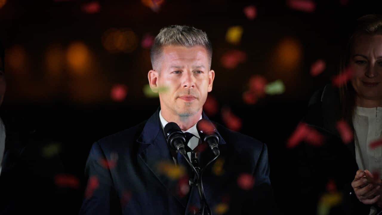 A medium close up image of new Hungarian prime minister Peter Magyar on election night.