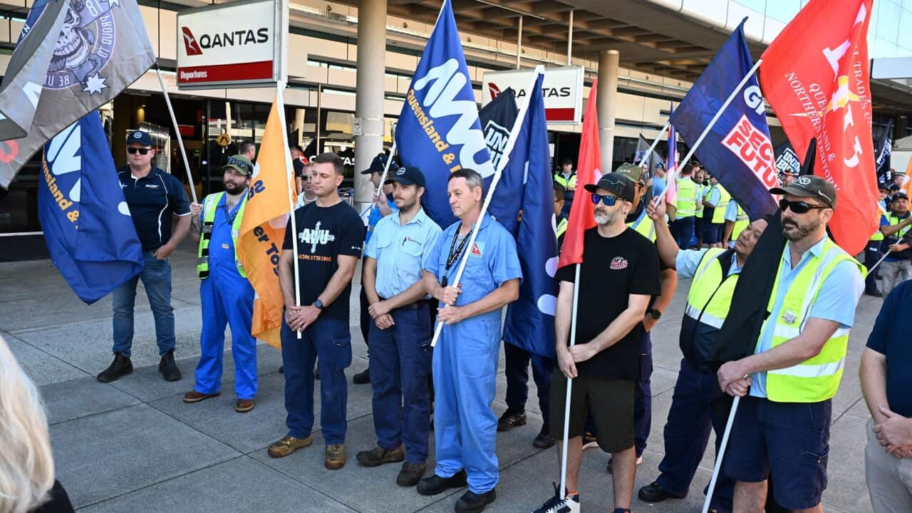 Qantas engineers participate in a protest over wages at Brisbane Qantas Domestic Terminal in Brisbane (AAP)