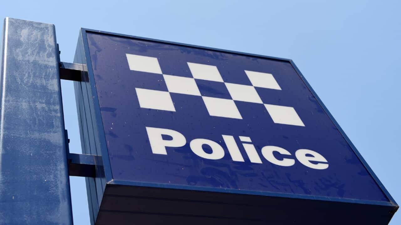 A police station sign