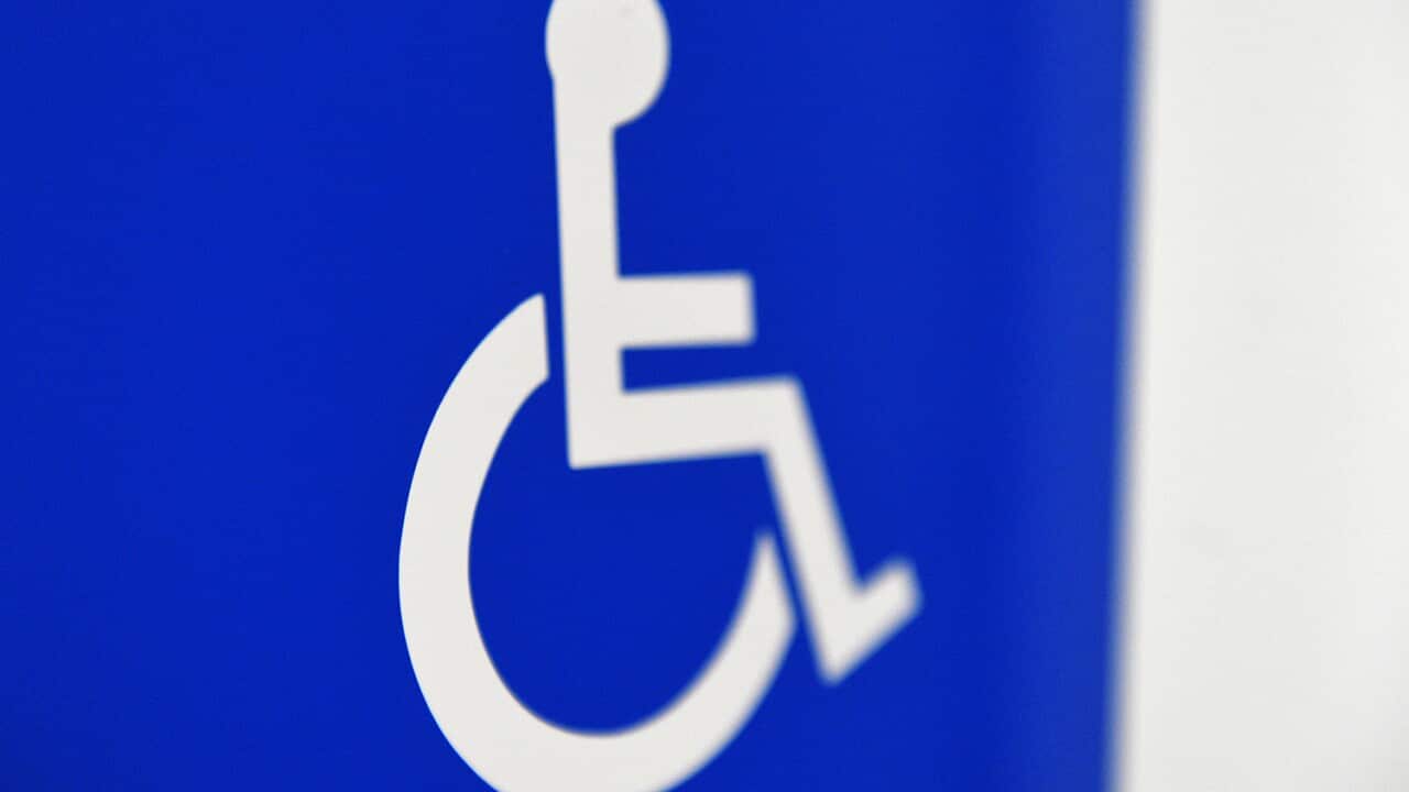 A disability sign is seen at Parliament House in Canberra on Wednesday, April 27, 2016. (AAP Image/Mick Tsikas) NO ARCHIVING