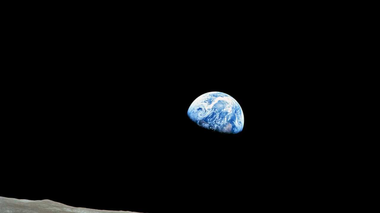A handout picture released by NASA on 25 December 2013 shows a view of planet Earth seen from the Moon, at space, 24 December 1968. (EPA/NASA)