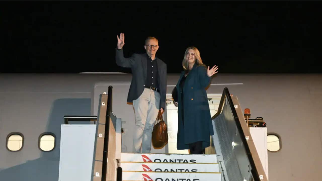 Australian Prime Minister Anthony Albanese and partner Jodie Haydon board the plane to Europe for a NATO Leaders' Summit in Europe.