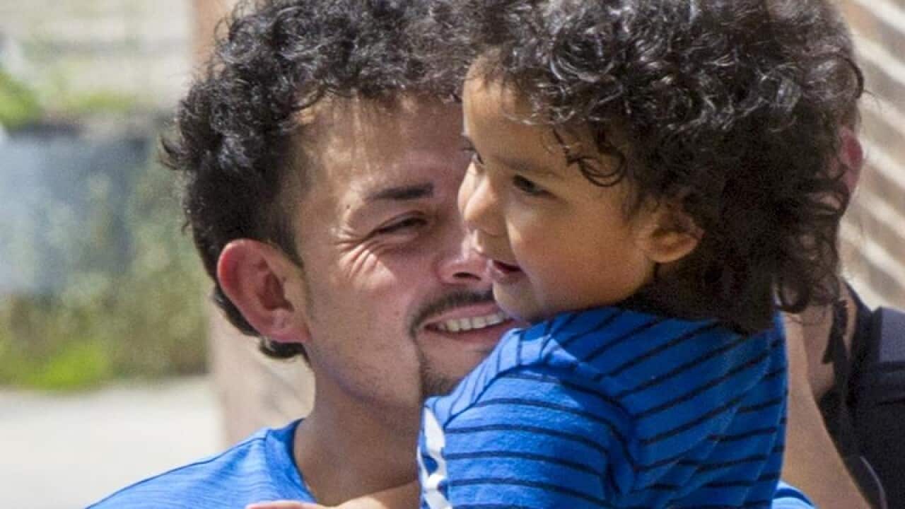Ever Reyes Mejia is reunited with his 3-year-old son.