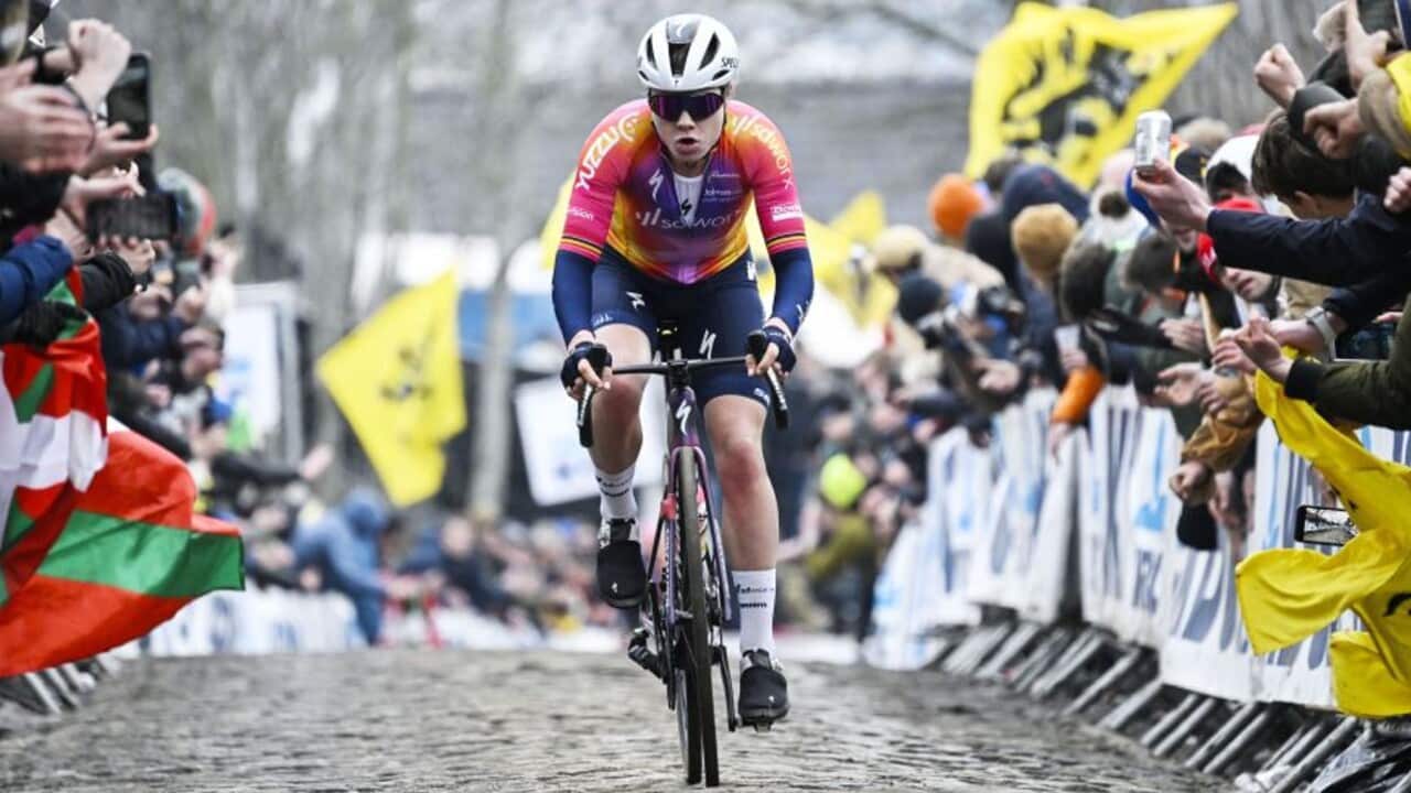 Lotte Kopecky of SD Worx tackles the cobbles during the Tour of Flanders