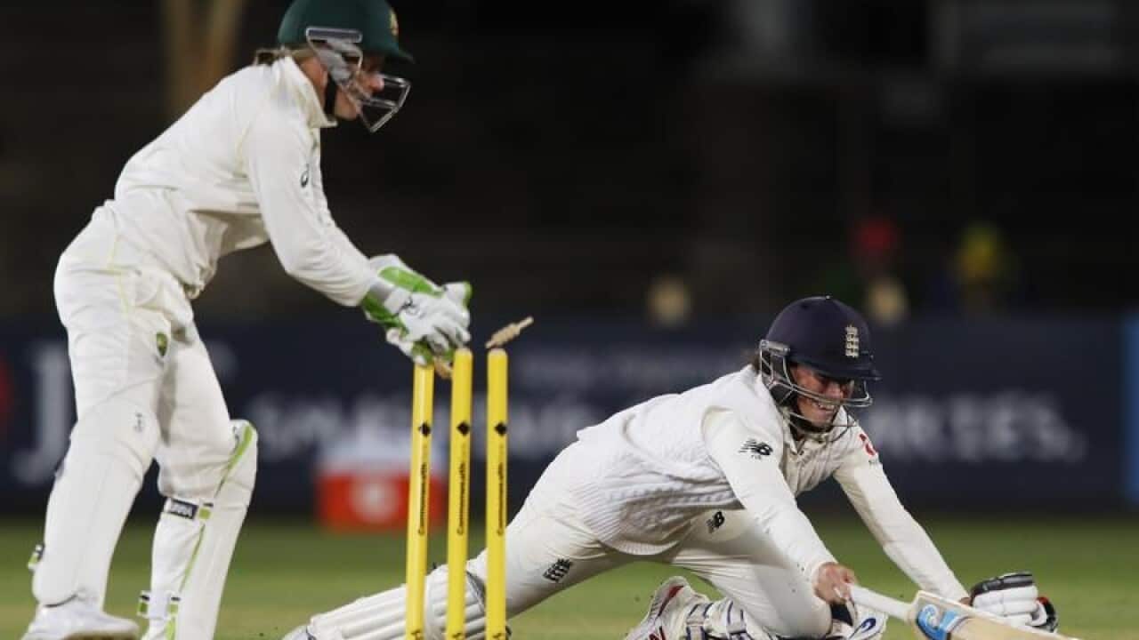 England's Georgia Elwiss dives to make her ground during the Test.