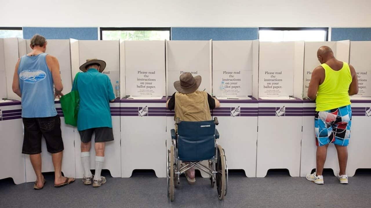 People in Darwin filling in their ballot papers at the last election