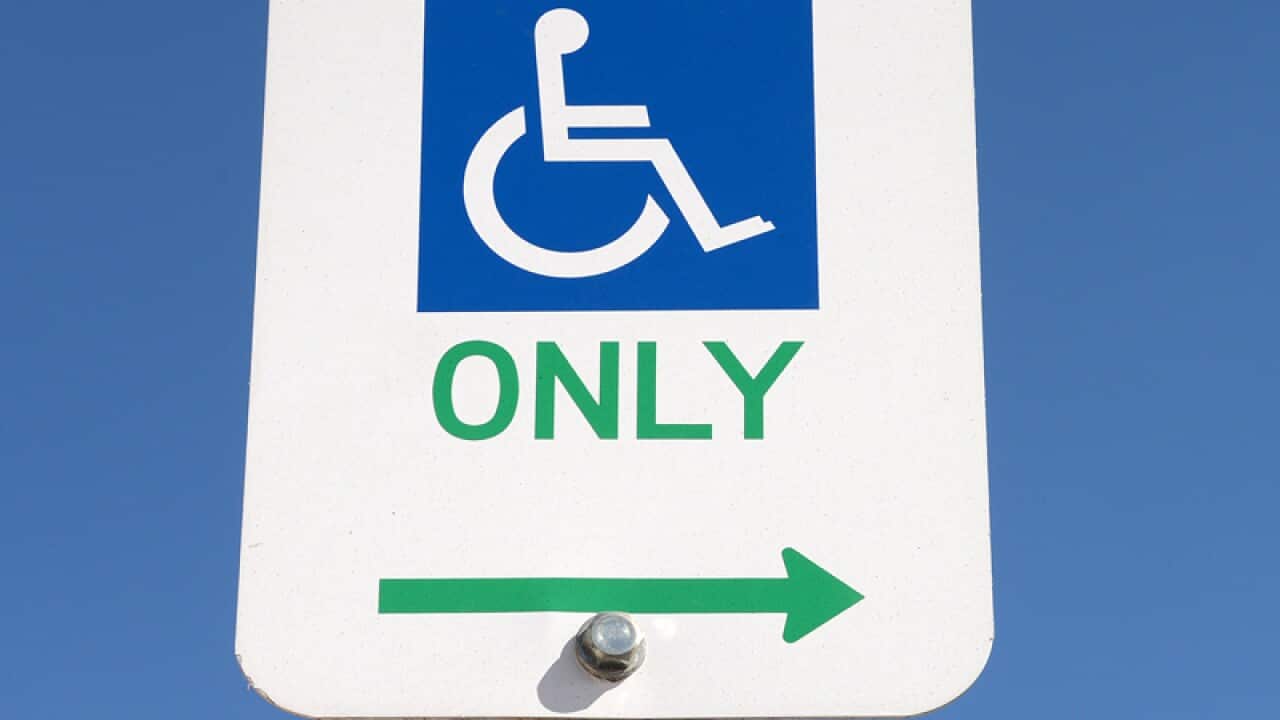 A disability parking sign.