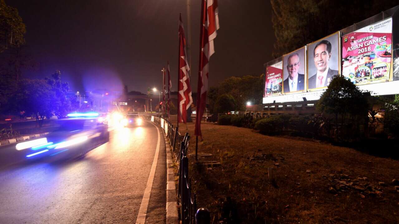 Posters of Prime Minister Scott Morrison and Indonesian President Joko Widodo near Halim International airport in Jakarta
