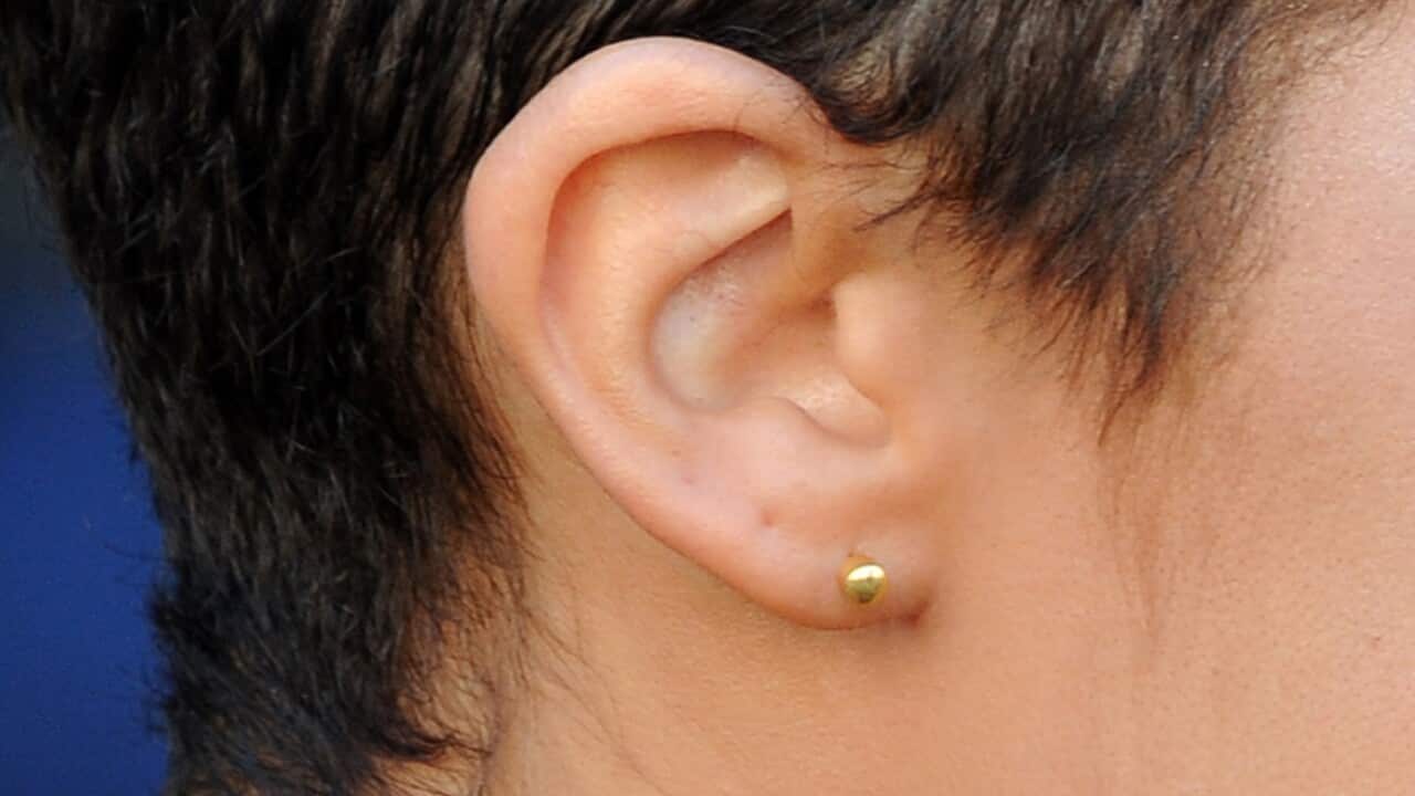 Close-up photo of woman’s ear (AAP)