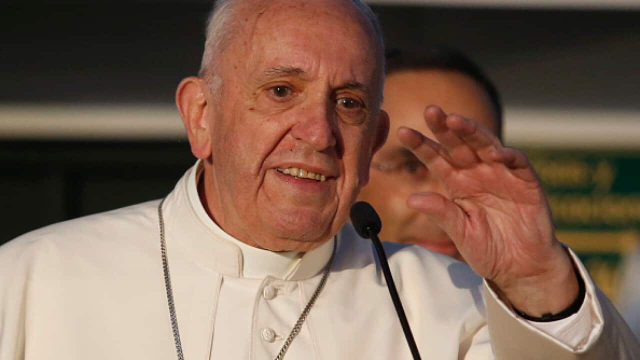 Pope Francis greets Colombians in Bogota.