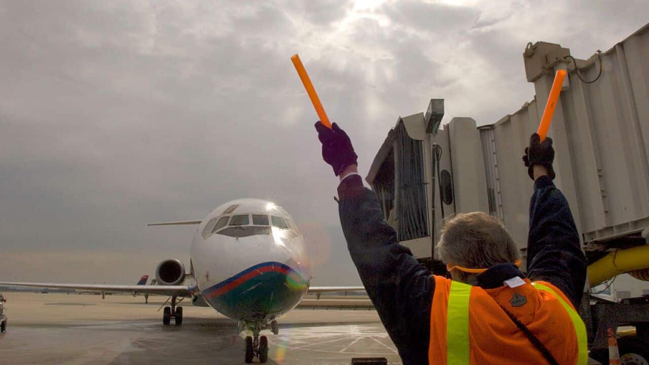 Airplane guided into gate, Atlanta airport