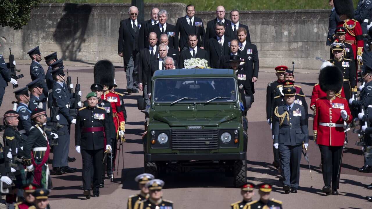 Queen Elizabeth bade farewell to Prince Philip at a funeral on Saturday that celebrated his seven decades of service.