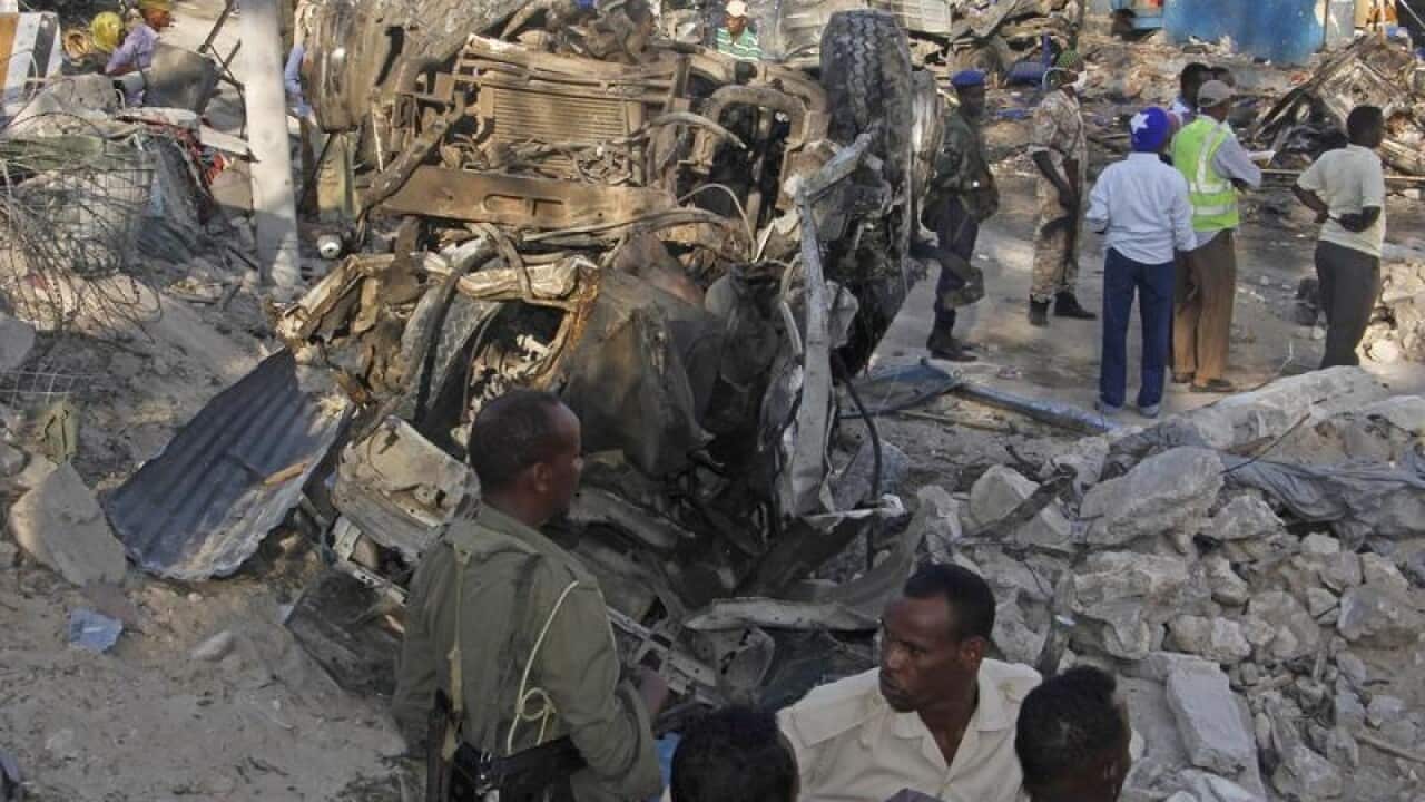 The wreckage of vehicles after a car bomb exploded in Mogadishu.