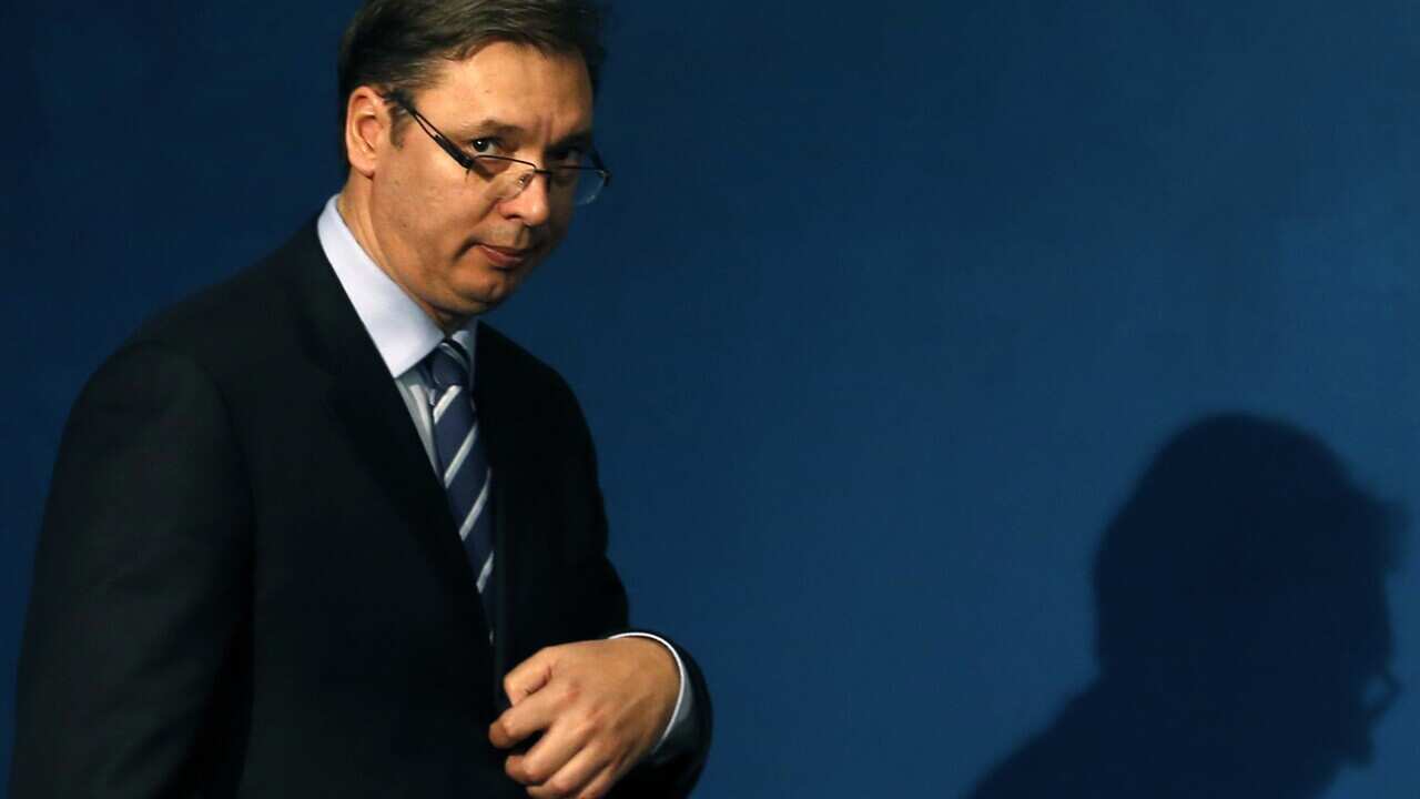 In this photo taken Monday, Oct. 24, 2016, Serbian Prime Minister Aleksandar Vucic arrives at a press conference in Belgrade, Serbia.