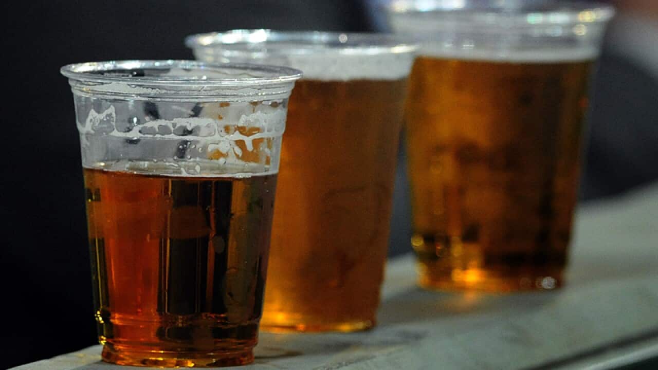 Cups of beer at a sporting venue
