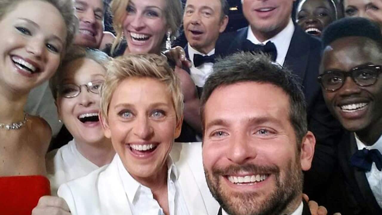 Actors as they pose for a "selfie" on a cell phone during the Oscars
