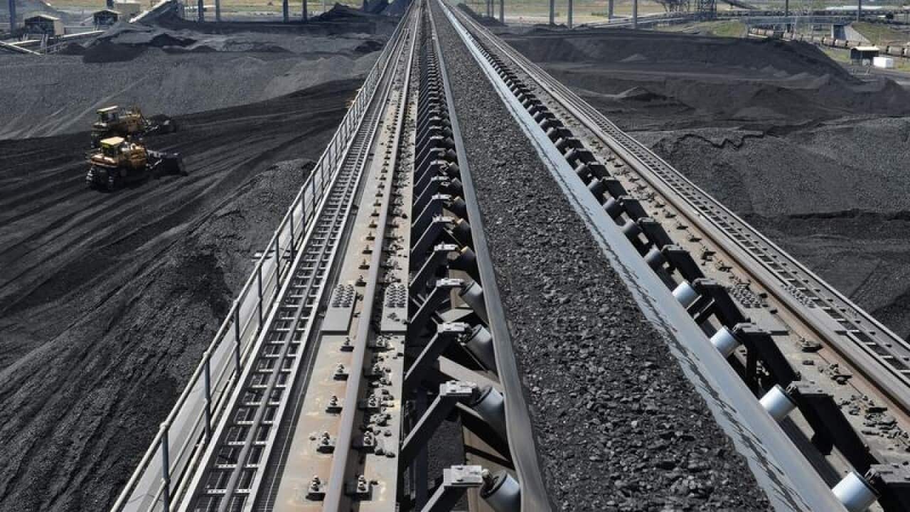 Coal is stockpiled before being loaded onto ship at Gladstone.