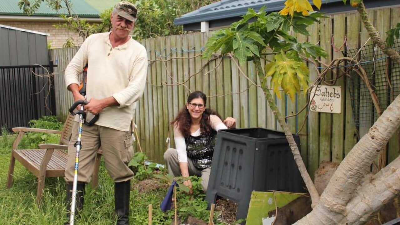 Peter and Saheb volunteering at the garden