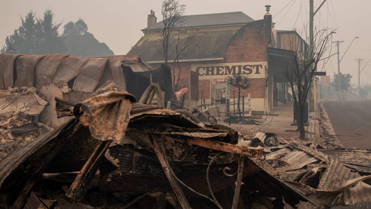Destroyed buildings are seen in Cobargo, NSW, Wednesday, January 1, 2020. Several bushfire-ravaged communities in NSW have greeted the new year under immediate threat. (AAP Image/Sean Davey) NO ARCHIVING