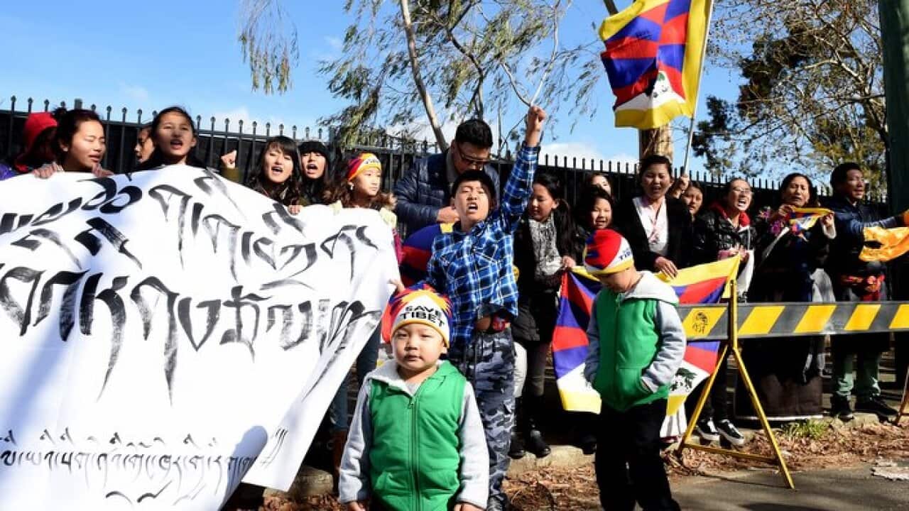 Tibetans wait for the arrival of the Dalai Lama at Katoomba public school, 2015