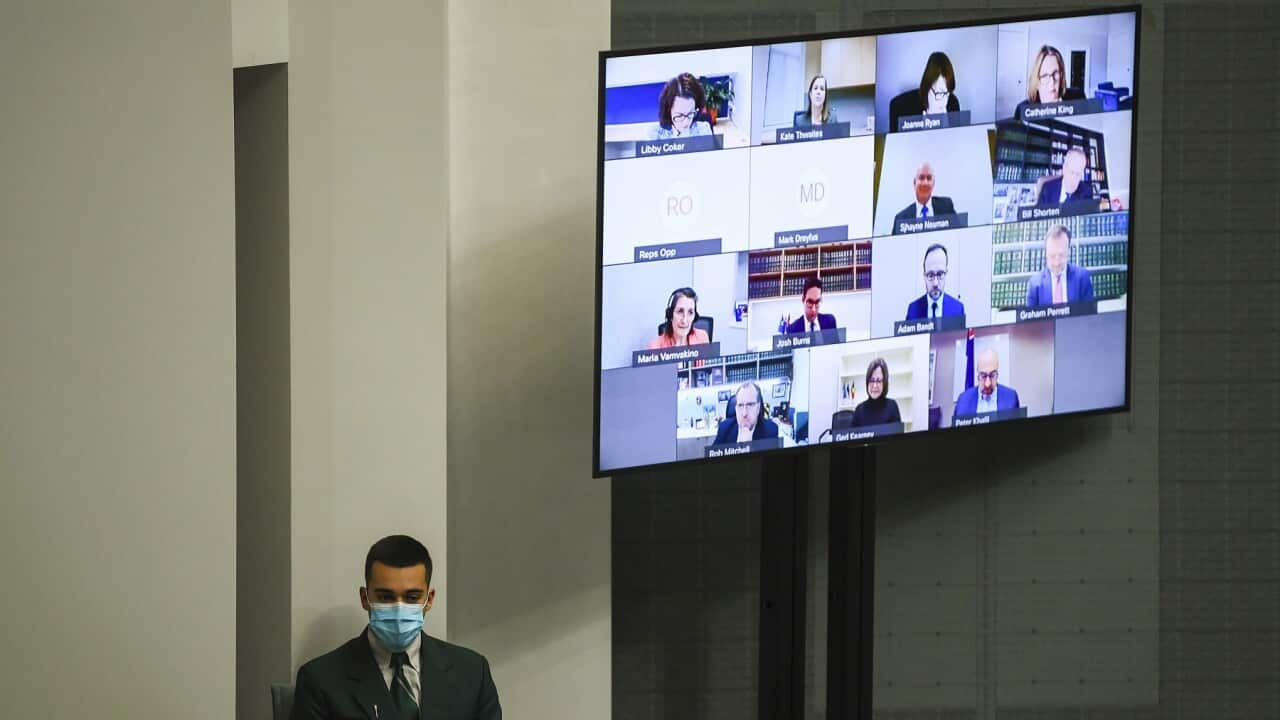 Australian MPs attend via video link at Parliament House in Canberra