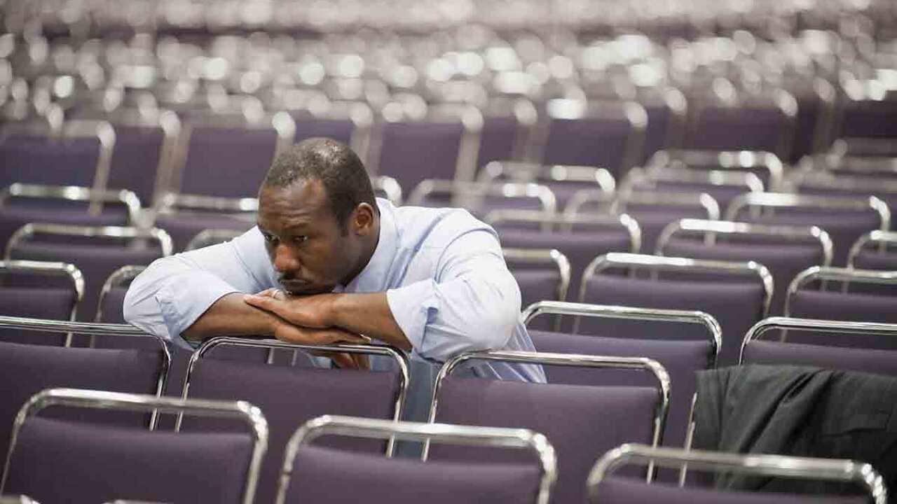 Man in waiting room stressed