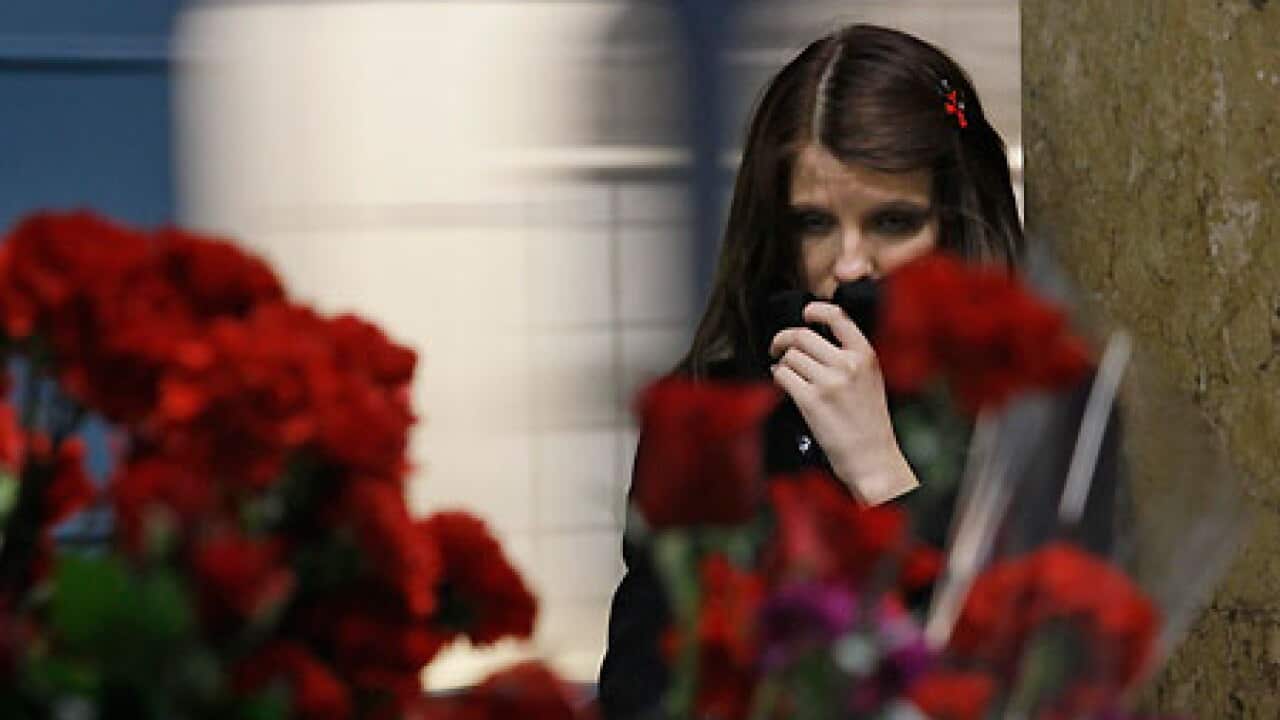 moscow_girl_grieving_100330_ap_aap_B_1637661641