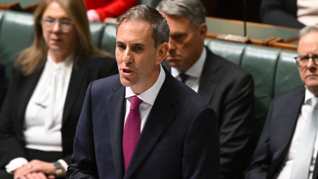 Jim Chalmers standing and speaking in the House of Representatives.