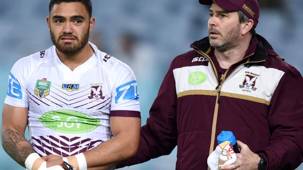 Dylan Walker of the Sea Eagles leaves the field injured